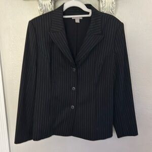 Black/white tailored pinstripe suit jacket.